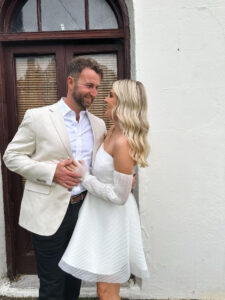 bride and groom smiling at each other at a Tasmanian venue