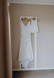 brides dress hanging up